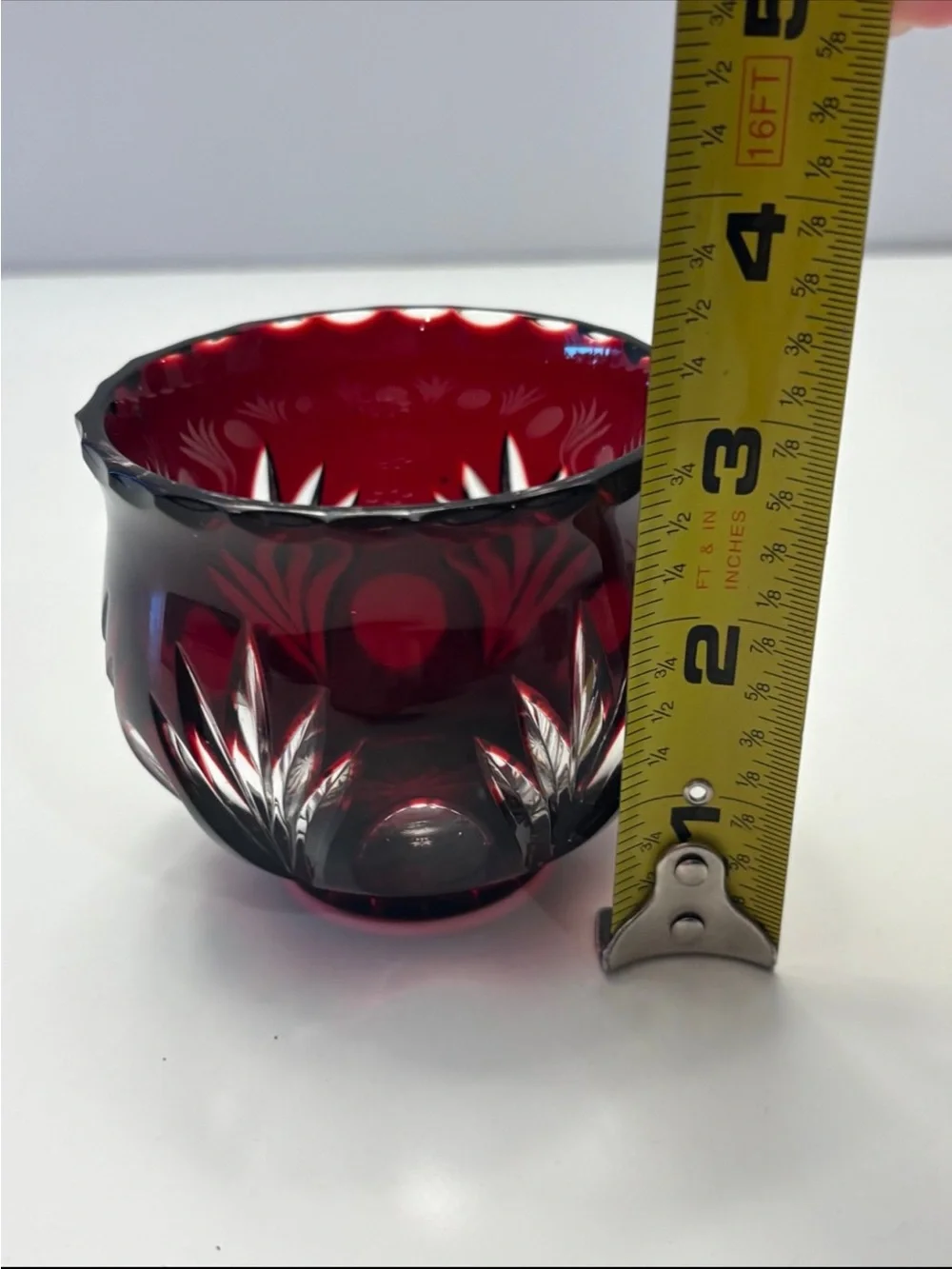 Bohemian Red Crystal glass votive candle holder features intricate cut-to-clear